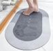Водопоглащающий овальный коврик для ванной комнаты Home 50х80, антискользящий диатомитовый впитывающий воду коврик для ног, серый